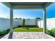 View of backyard and patio overlooking fenced yard at 5530 N 9Th St # 3, Tampa, FL 33604