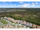 Aerial view of a new home community with lake access and conservation at 1039 Seagrape Dr, Ruskin, FL 33570