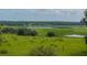 Serene landscape with a lake and lush greenery at 34868 Prospect Rd, Dade City, FL 33525