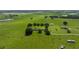 Aerial view of a large property with two houses and lush green pastures at 34868 Prospect Rd, Dade City, FL 33525