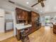 Kitchen with built-in desk and laundry area nearby at 34868 Prospect Rd, Dade City, FL 33525