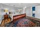 Bright bedroom featuring hardwood floors and an ensuite bathroom at 34868 Prospect Rd, Dade City, FL 33525