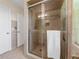 Clean shower with glass enclosure and tiled walls at 34868 Prospect Rd, Dade City, FL 33525