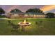 Firepit in spacious backyard with ample green space at 34868 Prospect Rd, Dade City, FL 33525