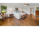 Main bedroom with rocking chair and large window at 34868 Prospect Rd, Dade City, FL 33525