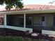 Spacious screened porch, perfect for relaxing outdoors at 405 Lemonwood Dr, Englewood, FL 34223