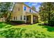 Two-story townhome with screened patio and lush landscaping at 17012 Vilesta Dr, Lutz, FL 33548