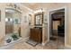 Well-appointed bathroom with a large vanity and access to bedroom at 9336 Melody Cir, Port Charlotte, FL 33981