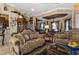 Living area features ornate furniture and a view to the dining area at 9336 Melody Cir, Port Charlotte, FL 33981