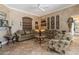 Elegant living room featuring two sofas, armchair, and a coffee table at 9336 Melody Cir, Port Charlotte, FL 33981