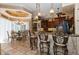 Kitchen with breakfast bar and adjacent dining area at 9336 Melody Cir, Port Charlotte, FL 33981