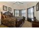Bright bedroom with a queen-size bed and plenty of natural light at 9336 Melody Cir, Port Charlotte, FL 33981