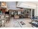 Open floor plan showcasing kitchen, living room and outdoor patio at 9336 Melody Cir, Port Charlotte, FL 33981