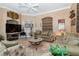 Spacious living room with comfortable seating and large TV at 9336 Melody Cir, Port Charlotte, FL 33981