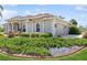 Spacious home with attached garage and landscaping at 9336 Melody Cir, Port Charlotte, FL 33981