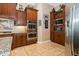 Modern kitchen with stainless steel appliances and granite countertops at 9336 Melody Cir, Port Charlotte, FL 33981