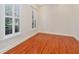 Bright office features hardwood floors, plantation shutters, and large windows at 15704 Cheston Ct, Tampa, FL 33647