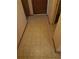 Hallway with patterned tile flooring at 5023 6Th St, Zephyrhills, FL 33542