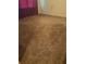 Spacious carpeted living room with neutral walls at 5023 6Th St, Zephyrhills, FL 33542