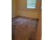 Simple carpeted bedroom with window and closet at 5023 6Th St, Zephyrhills, FL 33542