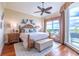 Spacious main bedroom with hardwood floors and water views at 130 Riviera Dunes Way # 403, Palmetto, FL 34221