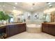 Spa-like bathroom with soaking tub and double vanity at 130 Riviera Dunes Way # 403, Palmetto, FL 34221