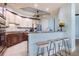 Modern kitchen with granite countertops and stainless steel appliances at 130 Riviera Dunes Way # 403, Palmetto, FL 34221