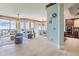 Open living space with water views and access to balcony at 130 Riviera Dunes Way # 403, Palmetto, FL 34221