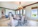Spacious dining area with large windows and water views at 130 Riviera Dunes Way # 403, Palmetto, FL 34221