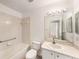 Clean bathroom featuring a bathtub, toilet, vanity, and modern light fixture at 1145 Almondwood Dr, Trinity, FL 34655