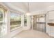 Cozy breakfast nook with large windows offering natural light and views of the outdoors at 1145 Almondwood Dr, Trinity, FL 34655