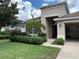 House exterior view with palm trees and manicured lawn at 10308 Holland Rd, Riverview, FL 33578