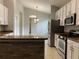 Spacious kitchen with granite countertops and stainless steel appliances at 10308 Holland Rd, Riverview, FL 33578
