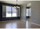 Bright dining room features tile floors, neutral walls, and a chandelier at 10308 Holland Rd, Riverview, FL 33578