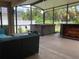 Covered patio with hot tub, seating area, and wet bar at 10308 Holland Rd, Riverview, FL 33578