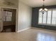 Spacious dining room with tile floors and access to another room at 10308 Holland Rd, Riverview, FL 33578