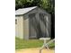 Outdoor storage shed with double doors at 10921 Temple Ave, Seminole, FL 33772