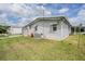 A well-maintained home exterior and green lawn space offer an inviting view at 5733 Pawnee St, Zephyrhills, FL 33542