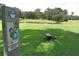 Betmar Golf Club, hole number five, par three, with a lush fairway, pond and mature trees at 5733 Pawnee St, Zephyrhills, FL 33542