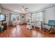Comfortable living room offers abundant natural light and a cozy atmosphere at 5733 Pawnee St, Zephyrhills, FL 33542