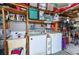 Garage with washer, dryer, and lots of storage at 5733 Pawnee St, Zephyrhills, FL 33542