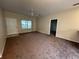 Living area with entryway and adjacent room views at 1178 Green Oak Trl, Port Charlotte, FL 33948