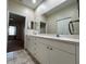 Double vanity bathroom with view of bedroom at 1178 Green Oak Trl, Port Charlotte, FL 33948