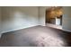 Living room with view of kitchen and access to other rooms at 1178 Green Oak Trl, Port Charlotte, FL 33948