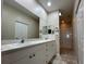 Double vanity bathroom with a shower at 1178 Green Oak Trl, Port Charlotte, FL 33948
