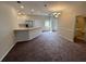 Spacious living room with carpet flooring and neutral walls at 1178 Green Oak Trl, Port Charlotte, FL 33948
