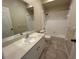 Bathroom with tub, toilet and vanity at 1178 Green Oak Trl, Port Charlotte, FL 33948