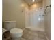 Bathroom with toilet and shower stall at 1178 Green Oak Trl, Port Charlotte, FL 33948