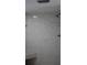Shower stall with tiled walls and a built-in seat at 6009 Sea Ranch Dr # 705, Hudson, FL 34667