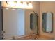Bathroom with a large mirror and double sinks at 6009 Sea Ranch Dr # 705, Hudson, FL 34667